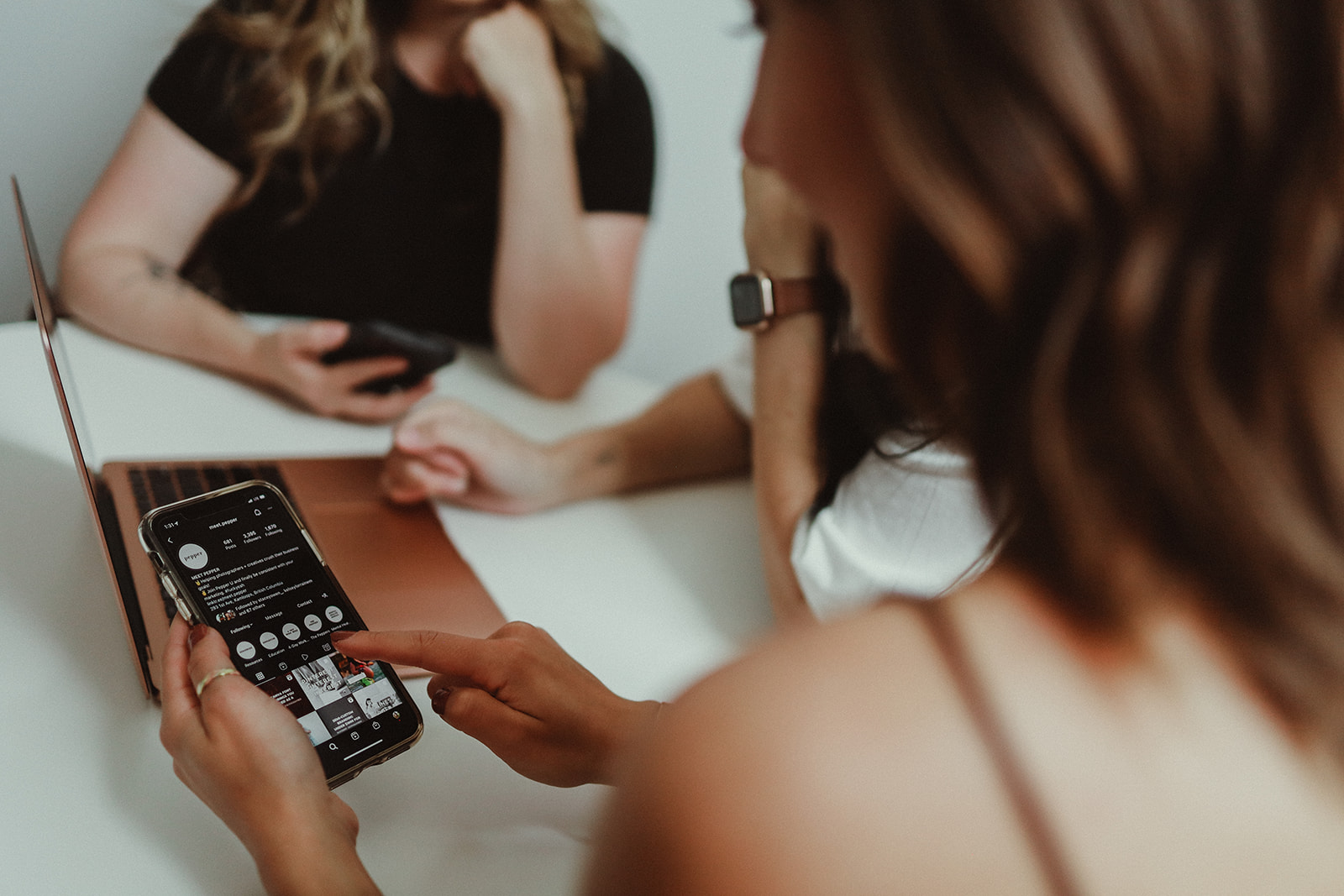 A photographer using Instagram and learning the community guidelines to avoid having her photography instagram account deactivated.