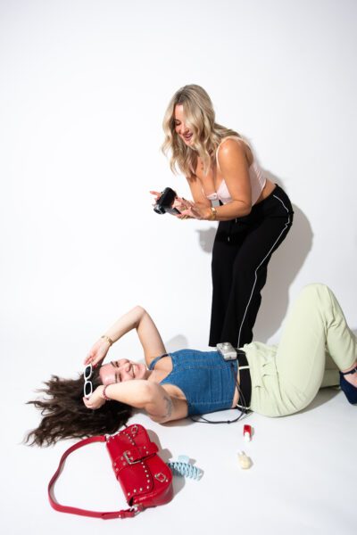 girl taking video of another girl at a content creation shoot