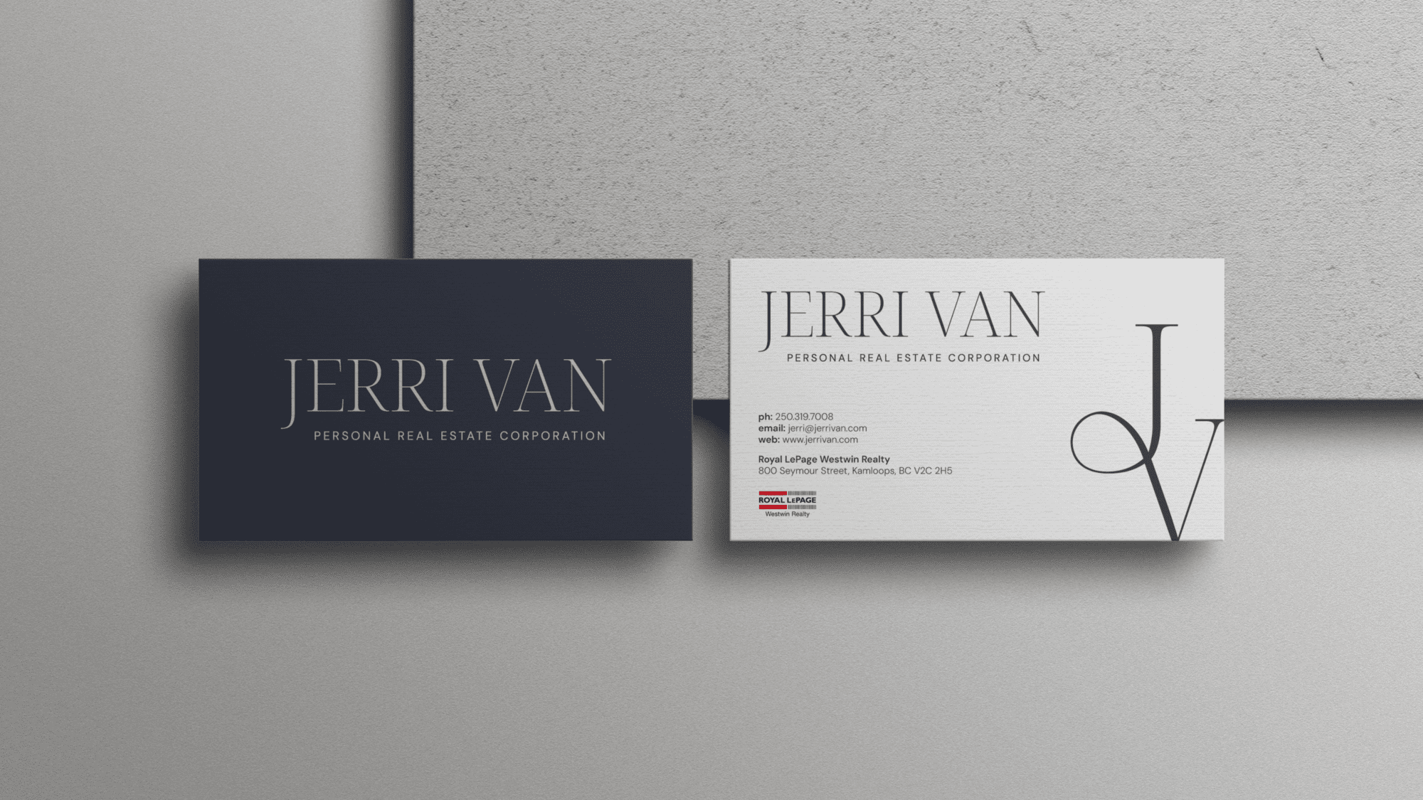 Business card mockup featuring Jerri Van PREC’s visual identity with a navy and cream colour palette, elegant serif logo, and real estate contact information.
