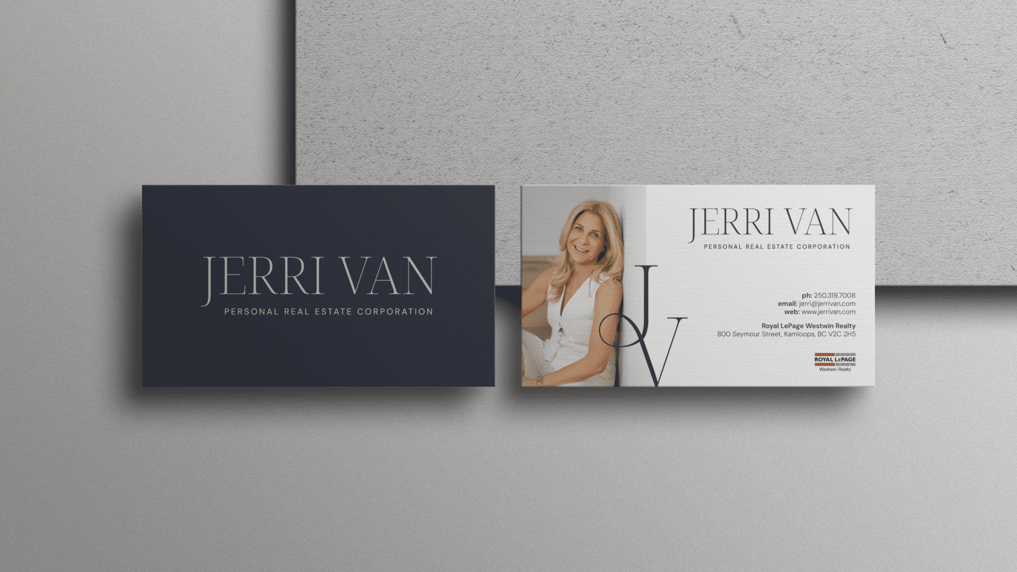 Jerri Van PREC business card mockup with a navy front design, cream back design, professional headshot, elegant JV monogram, and real estate contact details.