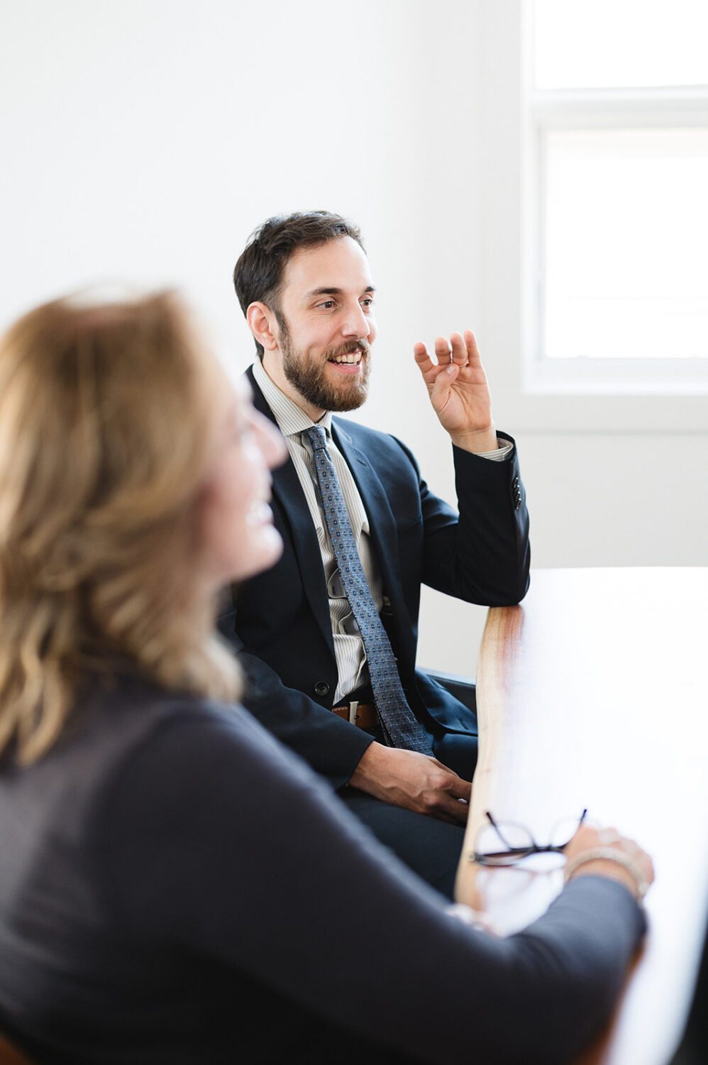 GoodWin Law team member working at a desk in a professional law office