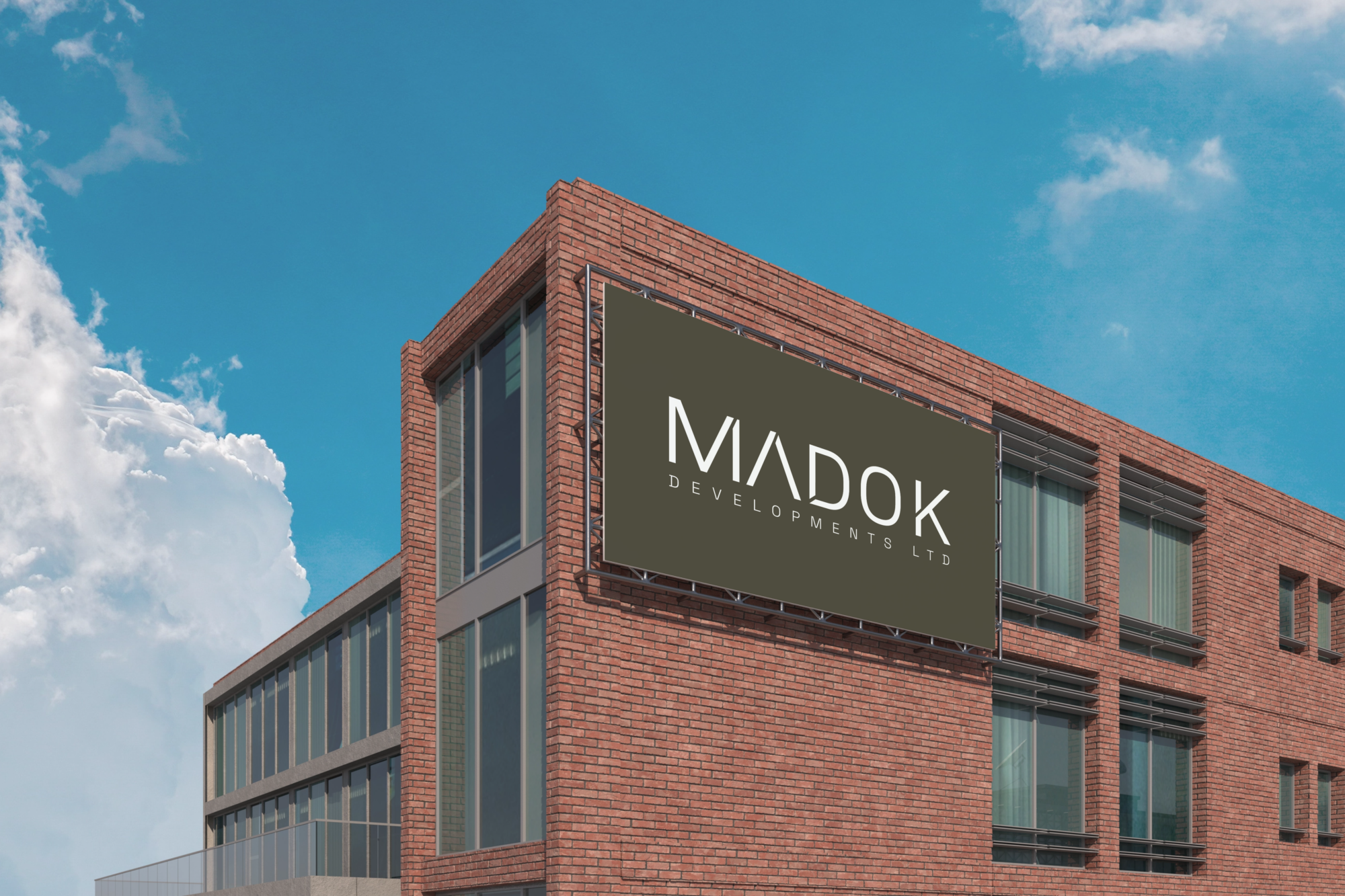 Madok Developments logo and visual identity, created by Pepper, displayed on a large olive-green billboard mounted to a modern brick building.