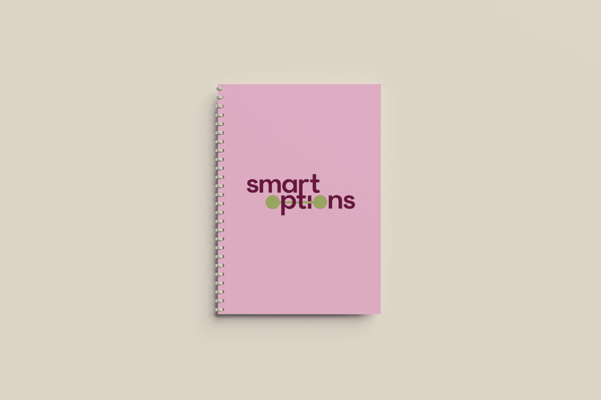 Pink spiral notebook featuring the refreshed Smart Options logo created by Pepper as part of the company’s Brand Refresh.