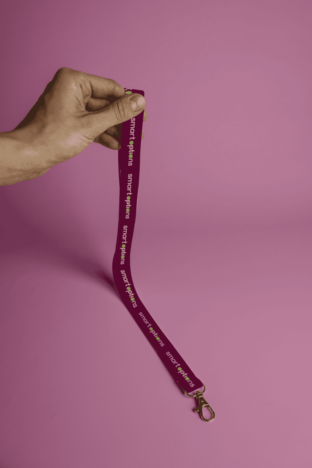 Burgundy Smart Options lanyard featuring the refreshed logo and brand colours created by Pepper through a Brand Refresh.
