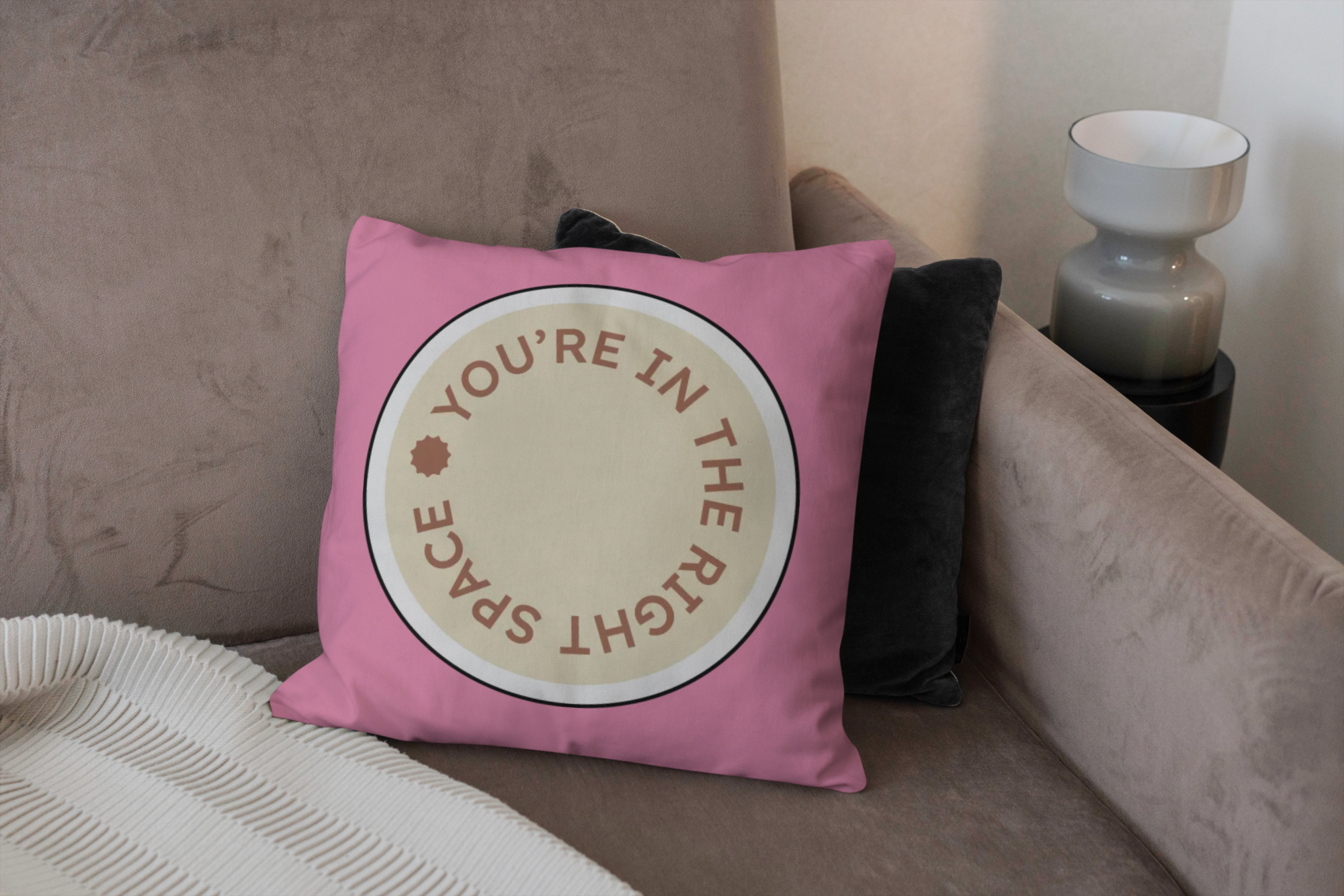 Pink decorative pillow featuring The Therapy Room’s “You’re in the right space” brand message created by Pepper as part of the Visual Identity.