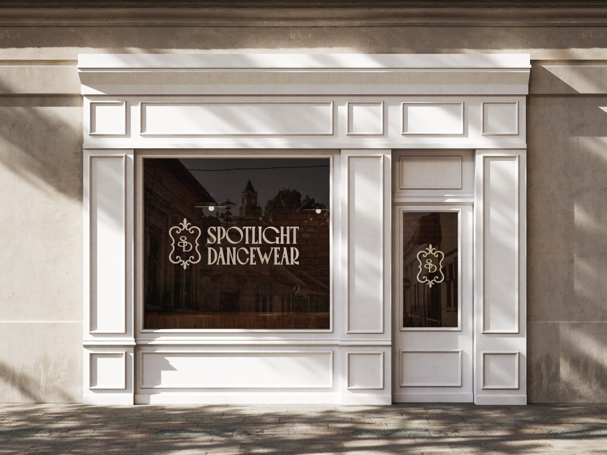 Spotlight Dancewear storefront mockup featuring custom exterior signage and visual identity designed by Pepper Marketing.