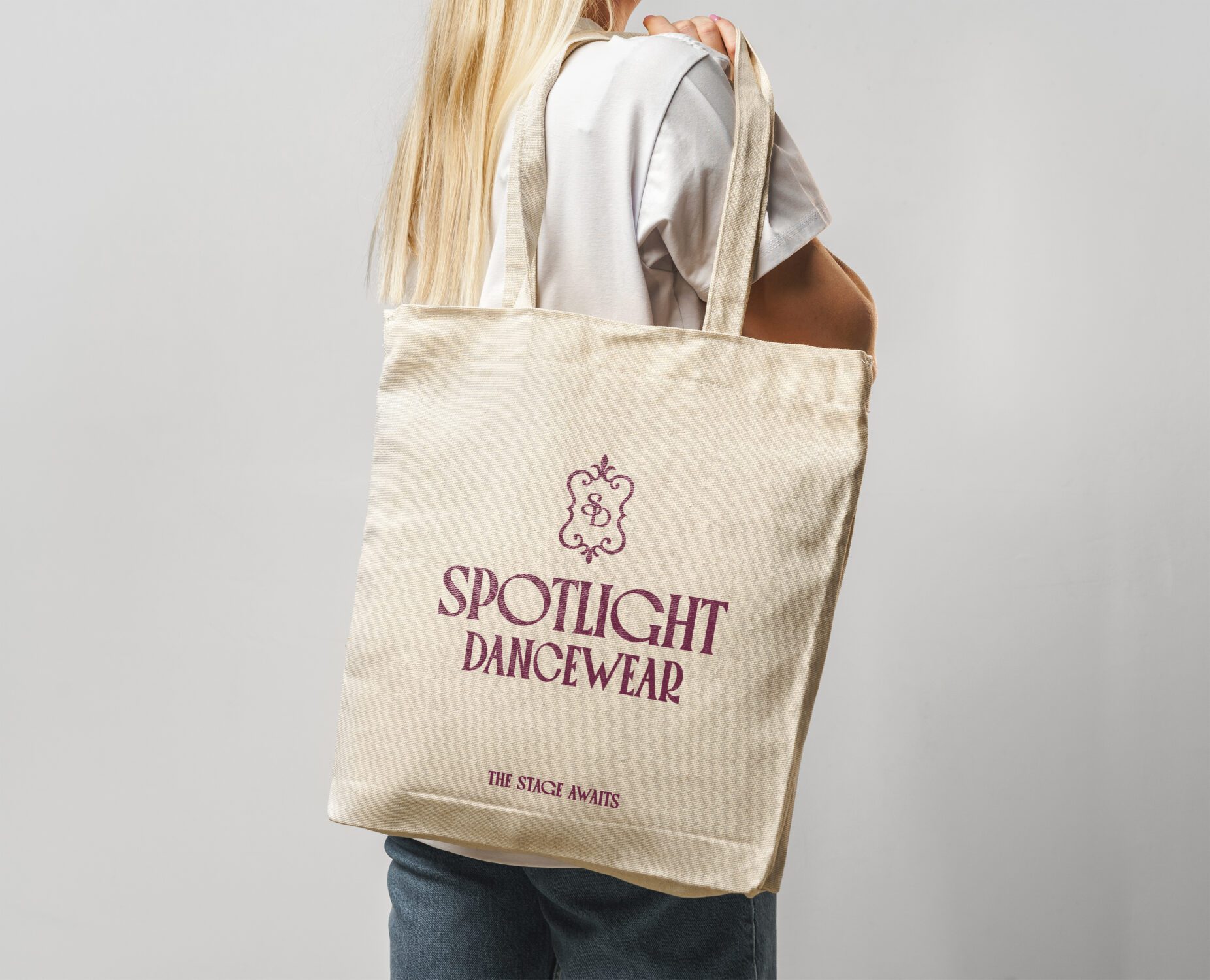 Spotlight Dancewear branded canvas tote bag featuring the custom logo and visual identity created by Pepper Marketing.