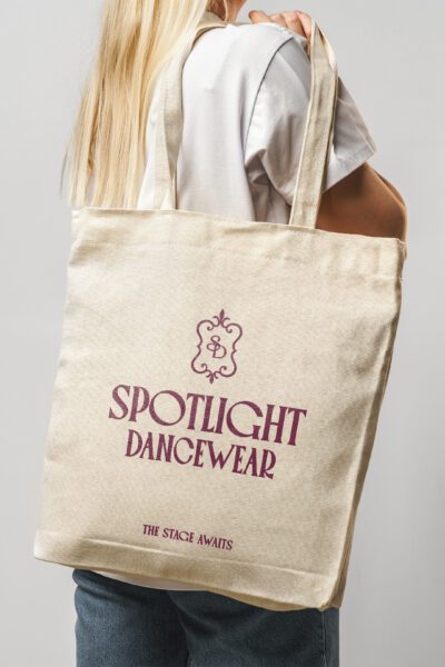Spotlight Dancewear branded canvas tote bag featuring the custom logo and visual identity created by Pepper Marketing.